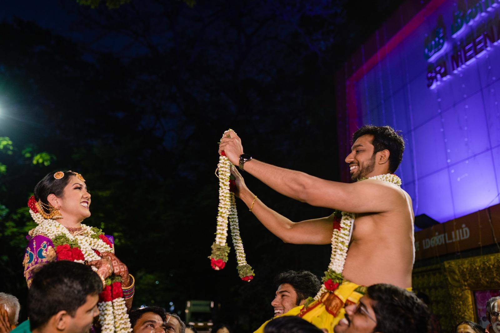 Shoulders high, garlands higher