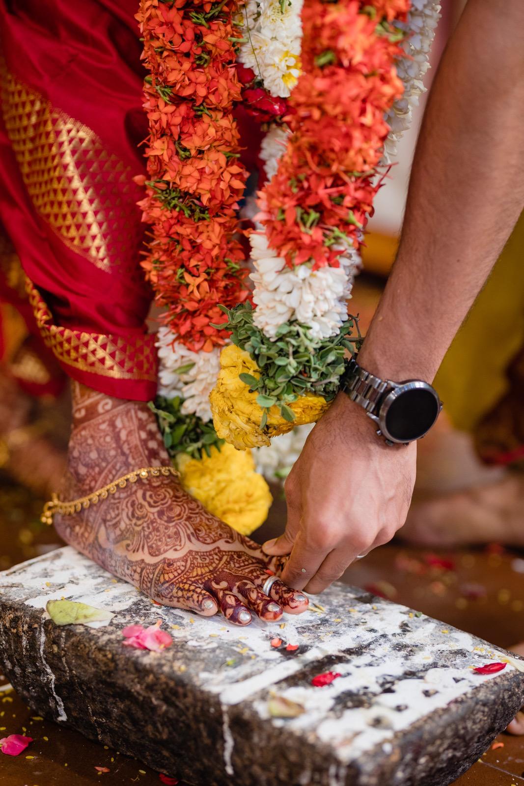 Foot on the ammi, ring on the toe